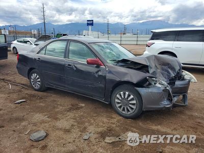 Czwarte zdjęcie samochodu z boku: 2002 TOYOTA CAMRY LE VIN:4T1BE32K32U575646 - miniatura