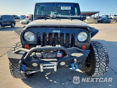 Piąte zdjęcie samochodu w środku: 2009 JEEP WRANGLER UNLIMITED SAHARA VIN:1J4GA59149L760569 - miniatura