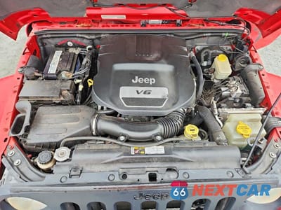 Zdjęcie 12 z 13 samochodu: 2014 JEEP WRANGLER UNLIMITED SAHARA VIN:1C4HJWEG0EL324418 - miniatura