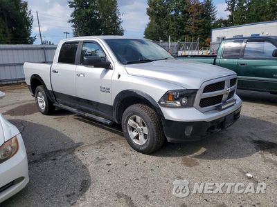 Czwarte zdjęcie samochodu z boku: 2014 RAM 1500 SLT VIN:1C6RR7LGXES360104 - miniatura