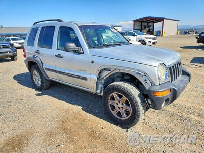 Czwarte zdjęcie samochodu z boku: 2004 JEEP LIBERTY SPORT VIN:1J4GL48K54W276934 - miniatura