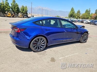 Trzecie zdjęcie samochodu z tyłu: 2022 TESLA MODEL 3 VIN:5YJ3E1EC3NF358483 - miniatura