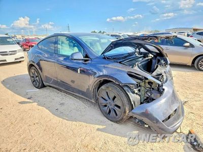 Czwarte zdjęcie samochodu z boku: 2025 TESLA MODEL Y VIN:7SAYGDEE9SA350340 - miniatura