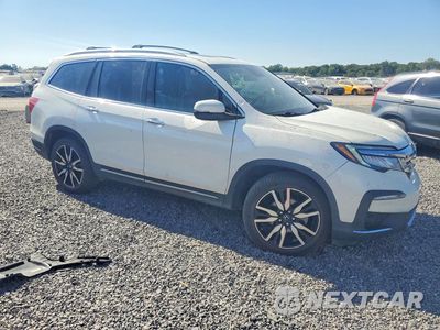 Czwarte zdjęcie samochodu z boku: 2019 HONDA PILOT TOURING VIN:5FNYF6H6XKB052091 - miniatura