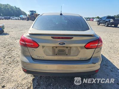Zdjęcie 6 z 13 samochodu: 2015 FORD FOCUS TITANIUM VIN:1FADP3J25FL259143 - miniatura