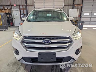 Piąte zdjęcie samochodu w środku: 2017 FORD ESCAPE TITANIUM VIN:1FMCU0J99HUA81479 - miniatura