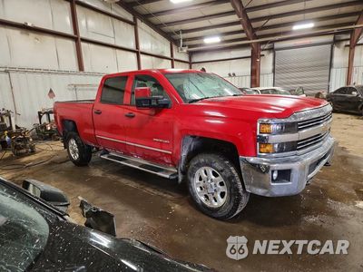 Czwarte zdjęcie samochodu z boku: 2015 CHEVROLET SILVERADO K2500 HEAVY DUTY LT VIN:1GC1KVE84FF161435 - miniatura