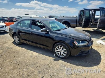 Czwarte zdjęcie samochodu z boku: 2015 VOLKSWAGEN JETTA SE VIN:3VWD17AJ9FM314893 - miniatura