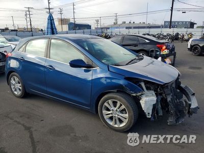 Czwarte zdjęcie samochodu z boku: 2015 HYUNDAI ELANTRA GT BASE VIN:KMHD35LH1FU245233 - miniatura
