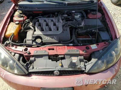 Zdjęcie 11 z 12 samochodu: 1999 MERCURY COUGAR V6 VIN:1ZWFT61L1X5641483 - miniatura