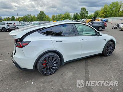 Trzecie zdjęcie samochodu z tyłu: 2023 TESLA MODEL Y VIN:7SAYGDEF7PF778085 - miniatura