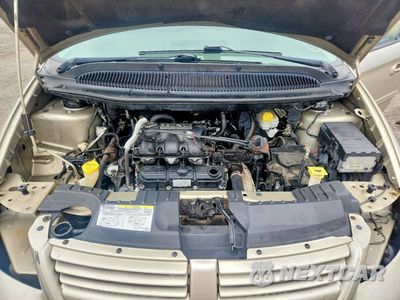Zdjęcie 12 z 13 samochodu: 2005 DODGE GRAND CARAVAN SXT VIN:2D4GP44L95R557317 - miniatura