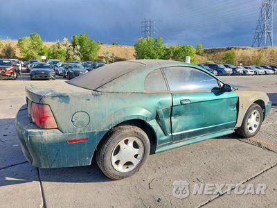 Trzecie zdjęcie samochodu z tyłu: 2000 FORD MUSTANG VIN:1FAFP4044YF300932 - miniatura