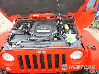 Zdjęcie 12 z 13 samochodu: 2015 JEEP WRANGLER UNLIMITED SAHARA VIN:1C4BJWEG7FL700197 - miniatura