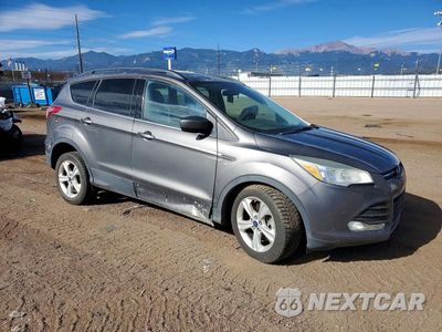 Czwarte zdjęcie samochodu z boku: 2014 FORD ESCAPE SE VIN:1FMCU9GX5EUB63053 - miniatura