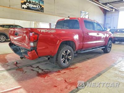 Trzecie zdjęcie samochodu z tyłu: 2018 TOYOTA TACOMA TRD SPORT VIN:3TMDZ5BNXJM042767 - miniatura