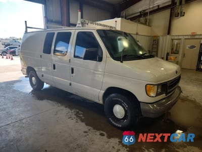 Czwarte zdjęcie samochodu z boku: 2000 FORD ECONOLINE E150 VAN VIN:1FTRE1427YHA35707 - miniatura