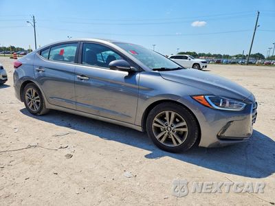 Czwarte zdjęcie samochodu z boku: 2018 HYUNDAI ELANTRA VALUE EDITION VIN:5NPD84LF0JH301938 - miniatura