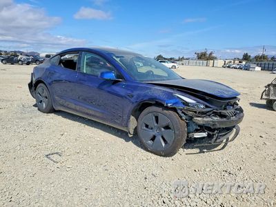 Czwarte zdjęcie samochodu z boku: 2023 TESLA MODEL 3 VIN:5YJ3E1EA7PF648131 - miniatura