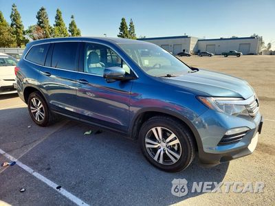 Czwarte zdjęcie samochodu z boku: 2016 HONDA PILOT EXLN VIN:5FNYF6H75GB117283 - miniatura