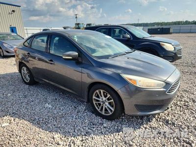 Czwarte zdjęcie samochodu z boku: 2017 FORD FOCUS SE VIN:1FADP3F21HL256395 - miniatura