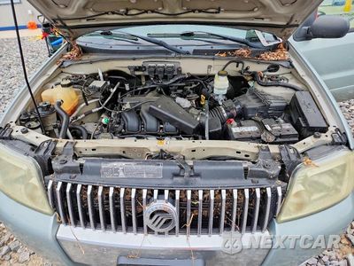 Zdjęcie 11 z 12 samochodu: 2005 MERCURY MARINER VIN:4M2YU56185DJ09031 - miniatura