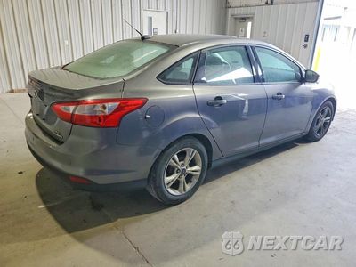 Trzecie zdjęcie samochodu z tyłu: 2014 FORD FOCUS SE VIN:1FADP3F22EL286288 - miniatura