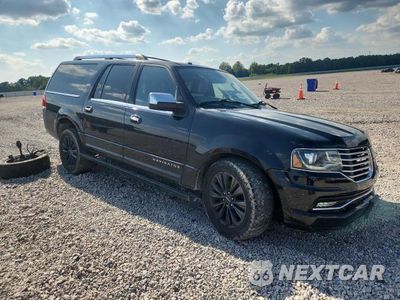 Czwarte zdjęcie samochodu z boku: 2015 LINCOLN NAVIGATOR L VIN:5LMJJ3JT9FEJ09976 - miniatura