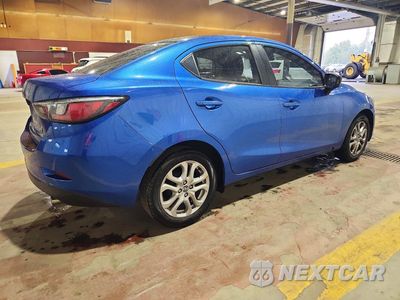 Trzecie zdjęcie samochodu z tyłu: 2016 SCION IA BASE VIN:3MYDLBZV8GY135800 - miniatura