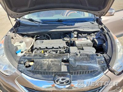Zdjęcie 12 z 13 samochodu: 2012 HYUNDAI TUCSON LIMITED VIN:KM8JUCAC2CU371186 - miniatura