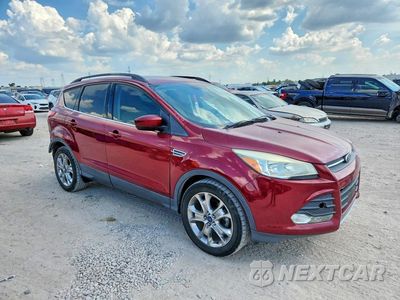 Czwarte zdjęcie samochodu z boku: 2014 FORD ESCAPE SE VIN:1FMCU0GX7EUE51488 - miniatura