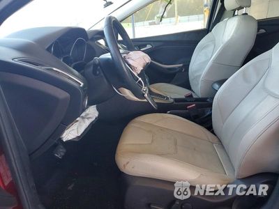 Zdjęcie 7 z 12 samochodu: 2016 FORD FOCUS TITANIUM VIN:1FADP3J28GL287763 - miniatura