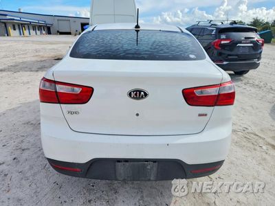 Zdjęcie 6 z 12 samochodu: 2014 KIA RIO LX VIN:KNADM4A32E6360670 - miniatura
