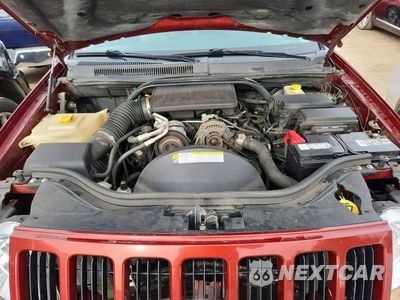 Zdjęcie 12 z 13 samochodu: 2009 JEEP GRAND CHEROKEE LAREDO VIN:1J8GR48K29C513076 - miniatura