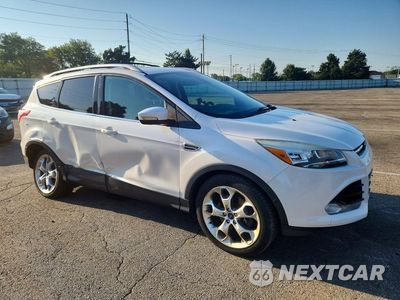 Czwarte zdjęcie samochodu z boku: 2013 FORD ESCAPE TITANIUM VIN:1FMCU9J95DUA04462 - miniatura