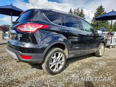 Trzecie zdjęcie samochodu z tyłu: 2014 FORD ESCAPE TITANIUM VIN:1FMCU0J90EUE40827 - miniatura