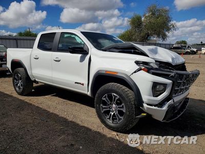 Czwarte zdjęcie samochodu z boku: 2024 GMC CANYON AT4 VIN:1GTP6DEK9R1134446 - miniatura