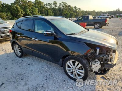 Czwarte zdjęcie samochodu z boku: 2011 HYUNDAI TUCSON LIMITED VIN:KM8JUCACXBU238870 - miniatura