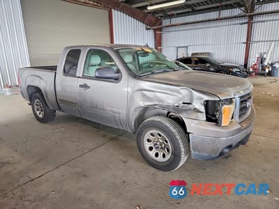 Czwarte zdjęcie samochodu z boku: 2007 GMC NEW SIERRA C1500 VIN:1GTEC19C27Z516480 - miniatura