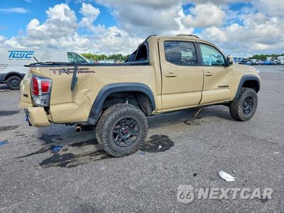 Trzecie zdjęcie samochodu z tyłu: 2020 TOYOTA TACOMA TRD OFF-ROAD VIN:3TMAZ5CN7LM134648 - miniatura