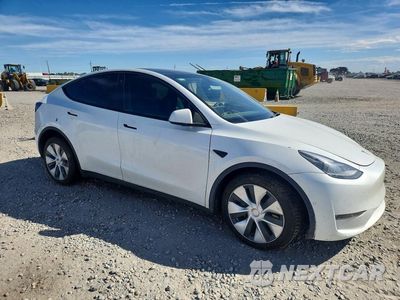 Czwarte zdjęcie samochodu z boku: 2022 TESLA MODEL Y VIN:7SAYGAEE4NF548281 - miniatura