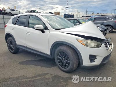 Czwarte zdjęcie samochodu z boku: 2016 MAZDA CX-5 SPORT VIN:JM3KE2BY3G0747747 - miniatura