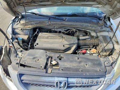 Zdjęcie 12 z 13 samochodu: 2003 HONDA PILOT EX VIN:2HKYF18413H619888 - miniatura