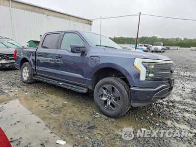 Czwarte zdjęcie samochodu z boku: 2022 FORD F150 LIGHTNING PRO VIN:1FTVW1EL0NWG10840 - miniatura