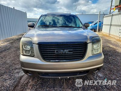Piąte zdjęcie samochodu w środku: 2011 GMC YUKON SLE VIN:1GKS2AE00BR128503 - miniatura