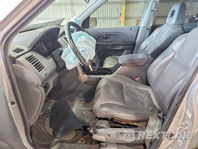 Zdjęcie 7 z 12 samochodu: 2004 HONDA PILOT EXL VIN:2HKYF18574H505789 - miniatura