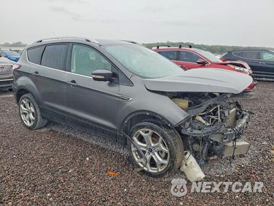 Czwarte zdjęcie samochodu z boku: 2017 FORD ESCAPE TITANIUM VIN:1FMCU9J99HUB66763 - miniatura