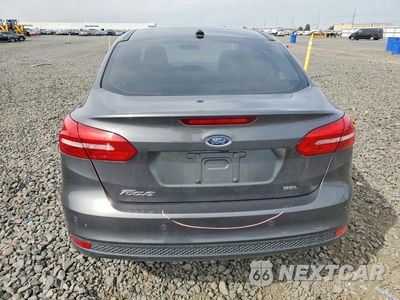 Zdjęcie 6 z 12 samochodu: 2017 FORD FOCUS SEL VIN:1FADP3H26HL304180 - miniatura