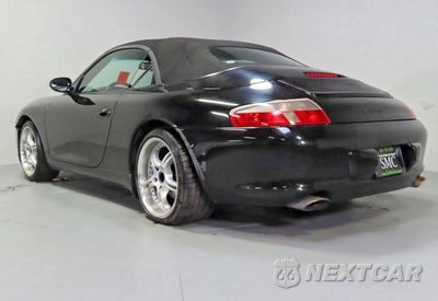 Czwarte zdjęcie samochodu z boku: 2004 PORSCHE 911 CARRERA VIN:WP0CA299X4S650956 - miniatura