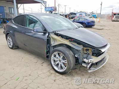Czwarte zdjęcie samochodu z boku: 2024 TESLA MODEL Y VIN:7SAYGDEDXRF046034 - miniatura